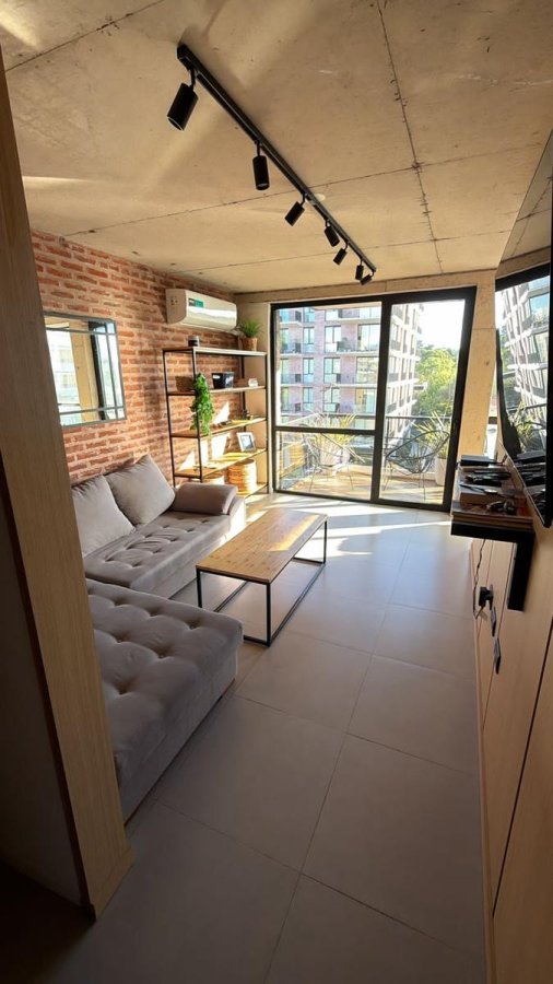 Departamento semipiso tres ambientes con cochera y terraza propia